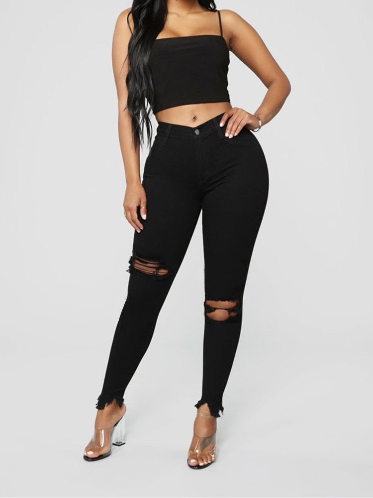 Zerrissene, einfarbige lange Jeanshose
