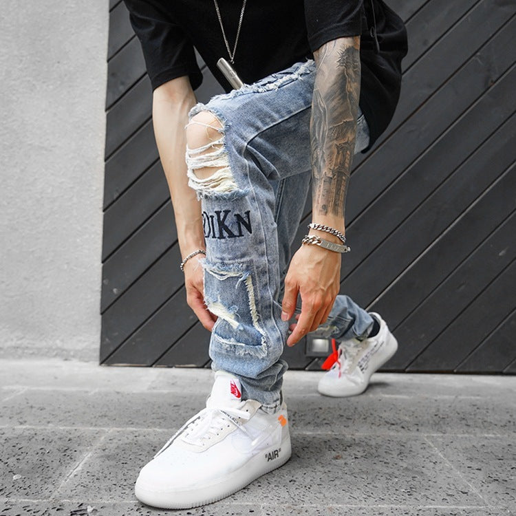 Knieloch Patch Patch Stoff Jeans Männer und Frauen Persönlichkeit Flut Marke hellblau Schlanke Füße lange Hosen