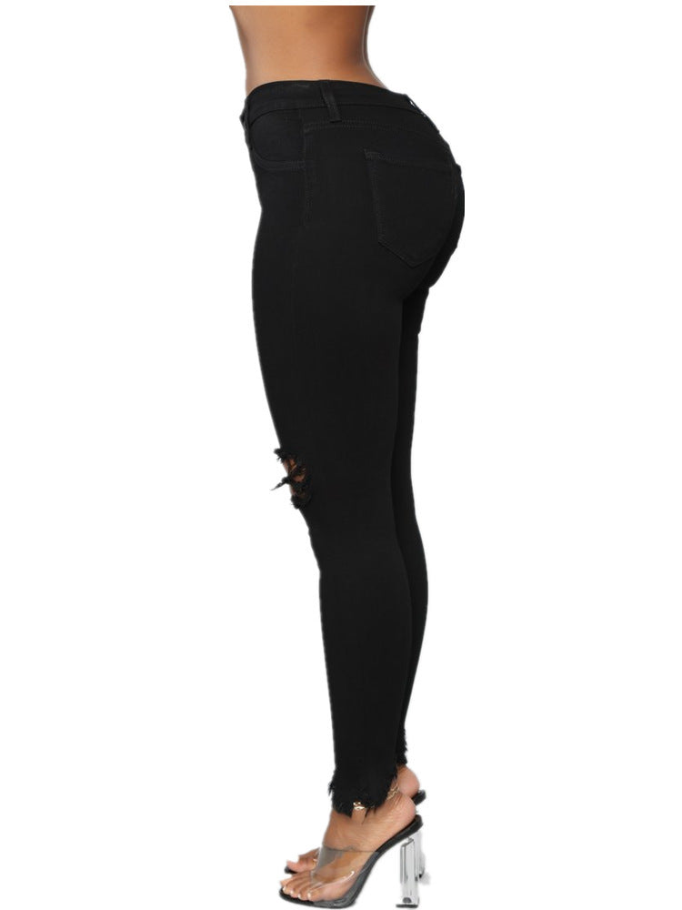 Zerrissene, einfarbige lange Jeanshose