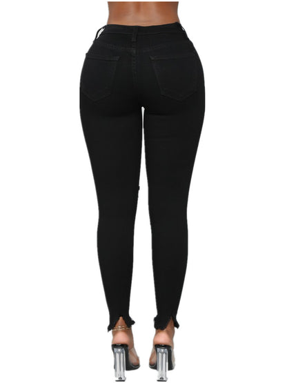 Zerrissene, einfarbige lange Jeanshose